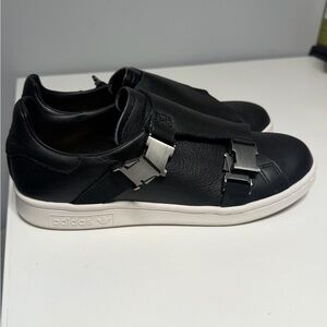 adidas Black Leather Slip-On Sneakers with White Sole and Silver Buckle Accents